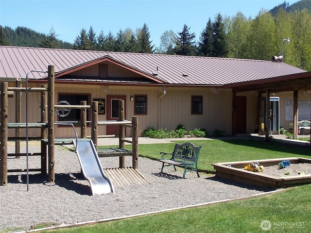 view of play area featuring a yard