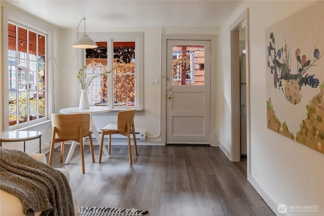 2035 Fairview Ave E Unit D, Seattle, WA 98102 - dining room with dark wood-type flooring and baseboards