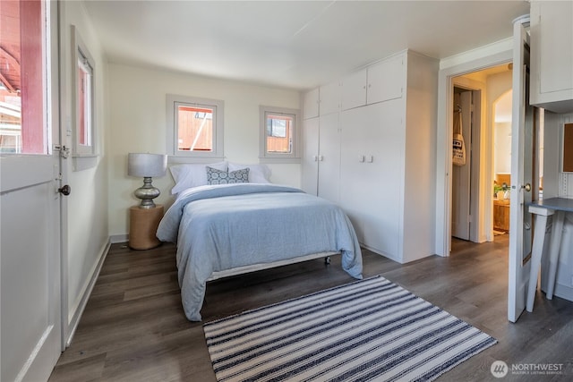 2035 Fairview Ave E Unit D, Seattle, WA 98102 - bedroom with baseboards and wood finished floors
