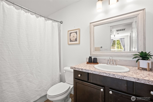 401 E Sunset Ridge Rd, Union, WA 98592 - bathroom featuring toilet, vanity, and a shower with shower curtain