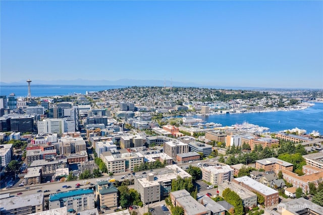 view of urban area with a large body of water
