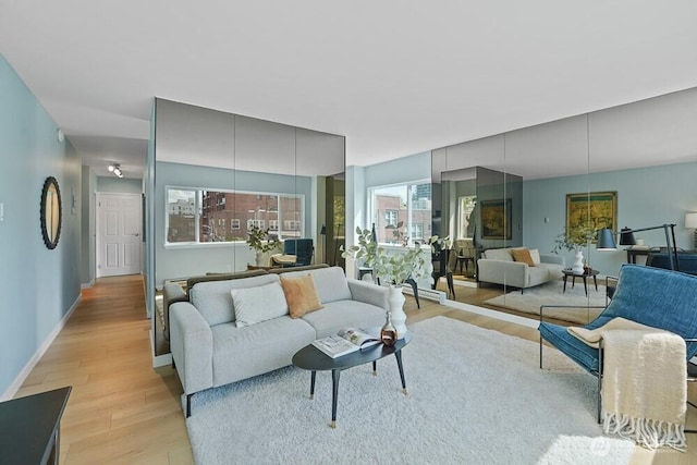 living area featuring light wood finished floors