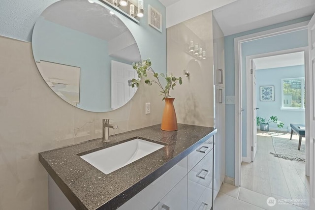 bathroom featuring vanity