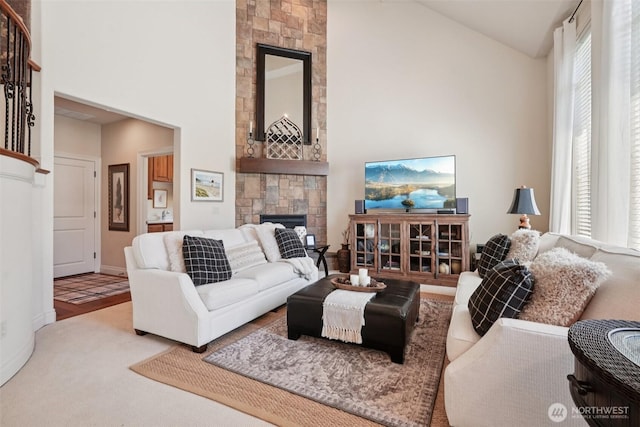1610 NW 34th Ave, Camas, WA 98607 - living area with high vaulted ceiling, a large fireplace, and carpet