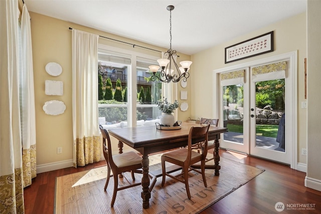 1610 NW 34th Ave, Camas, WA 98607 - dining space with healthy amount of natural light, french doors, wood finished floors, and a chandelier