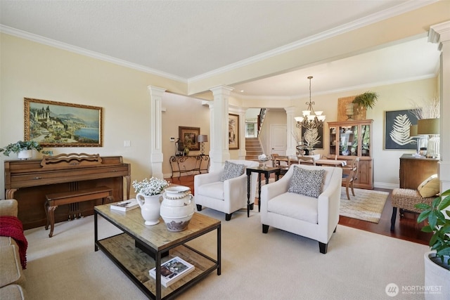 1610 NW 34th Ave, Camas, WA 98607 - living room featuring ornate columns, ornamental molding, and a chandelier