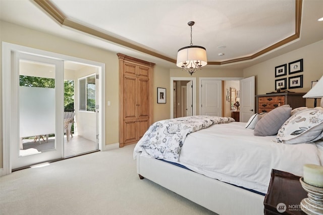 1610 NW 34th Ave, Camas, WA 98607 - bedroom featuring a tray ceiling, access to outside, light colored carpet, and a chandelier