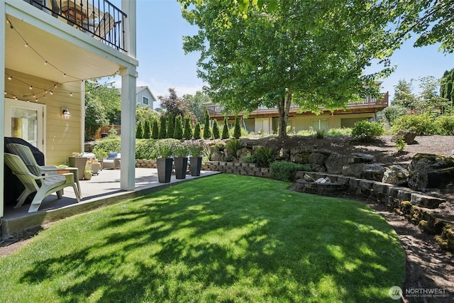 1610 NW 34th Ave, Camas, WA 98607 - view of grassy yard featuring a balcony and a patio