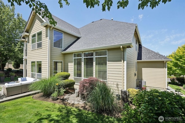 1610 NW 34th Ave, Camas, WA 98607 - back of house featuring an outdoor hangout area, a shingled roof, and a yard