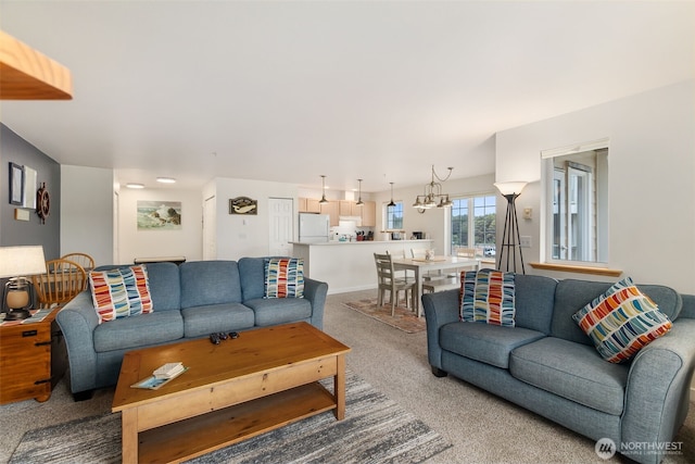 living room with baseboards and carpet