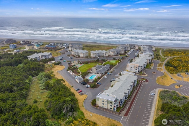 aerial view featuring a beach view and a water view
