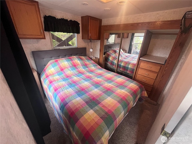 bedroom with light carpet