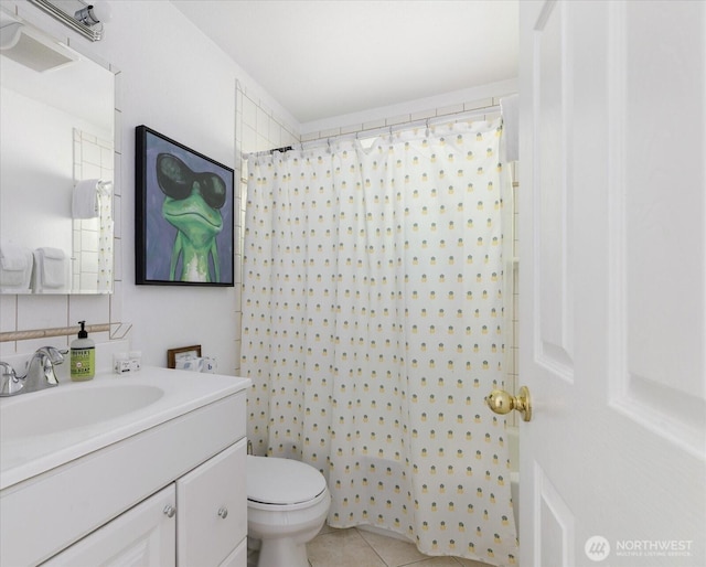 4966 Bradley Ln, Freeland, WA 98249 - bathroom featuring toilet, a shower with curtain, tile patterned flooring, and vanity