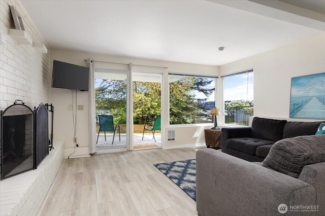 4966 Bradley Ln, Freeland, WA 98249 - living room featuring baseboards and light wood-style flooring