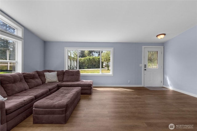 living room with wood finished floors and baseboards