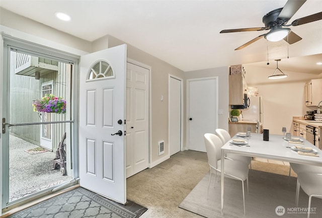 10822 SE 260th St Unit 2B1, Kent, WA 98030 - dining space with light colored carpet, ceiling fan, and visible vents