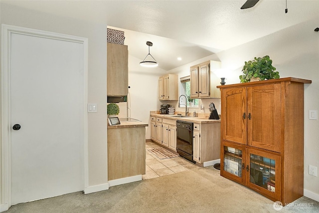10822 SE 260th St Unit 2B1, Kent, WA 98030 - kitchen featuring a sink, light countertops, black dishwasher, and light colored carpet