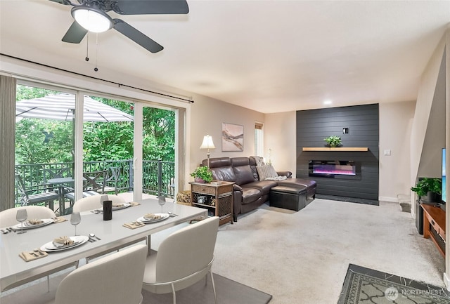 10822 SE 260th St Unit 2B1, Kent, WA 98030 - carpeted living room with ceiling fan and a fireplace