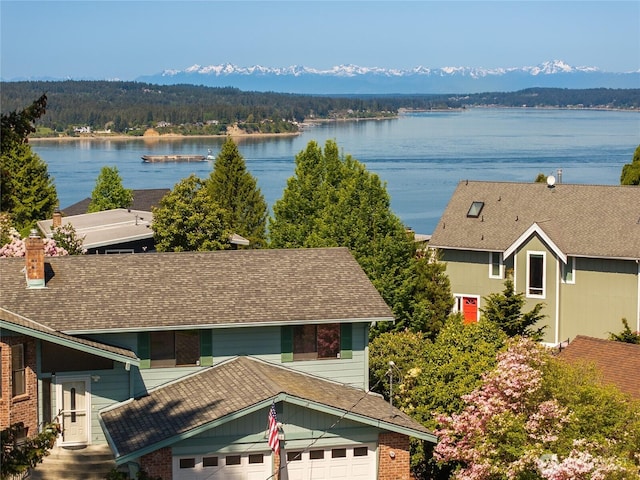 water view featuring a forest view