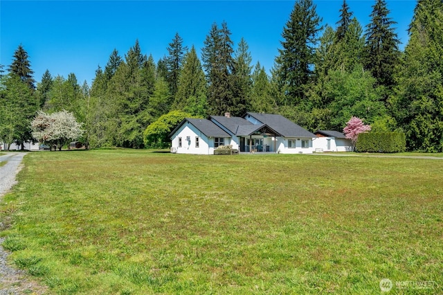 ranch-style house with a front yard