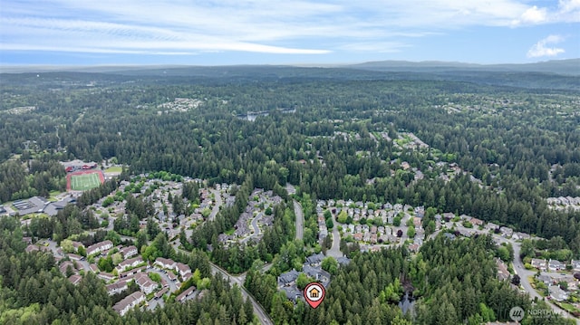 3758 257th Ave SE Unit 4-4, Issaquah, WA 98029 - aerial overview of property's location featuring a forest and a mountain backdrop