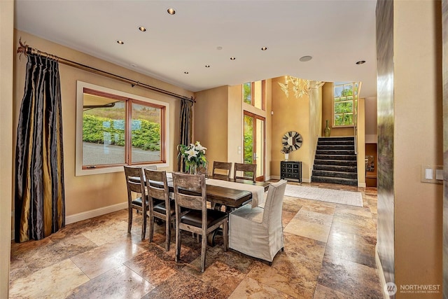 7212 164th St SW, Edmonds, WA 98026 - dining area featuring stone tile floors, stairway, recessed lighting, and a chandelier