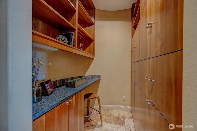 7212 164th St SW, Edmonds, WA 98026 - bar area featuring baseboards and stone tile flooring