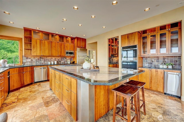 7212 164th St SW, Edmonds, WA 98026 - kitchen with built in appliances, a large island, open shelves, recessed lighting, and backsplash