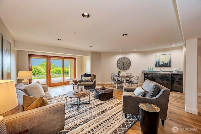 7212 164th St SW, Edmonds, WA 98026 - living room with light wood-style floors and recessed lighting