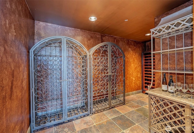 7212 164th St SW, Edmonds, WA 98026 - wine room with stone tile floors and recessed lighting