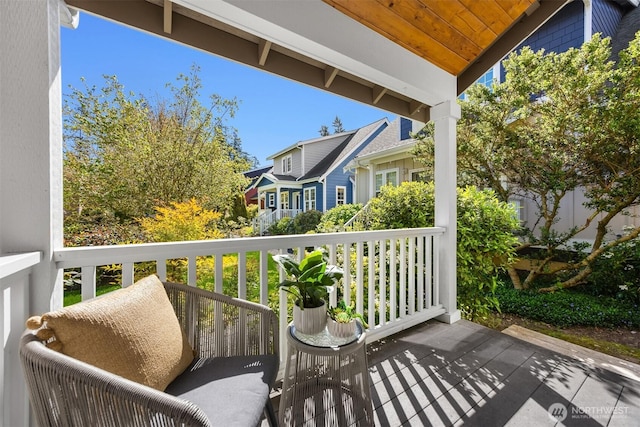 balcony featuring covered porch