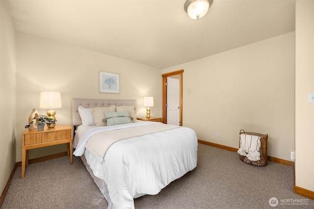 carpeted bedroom with baseboards