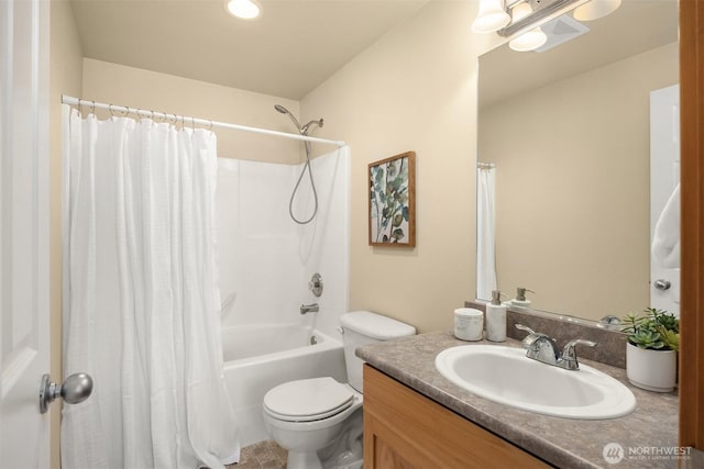 bathroom featuring toilet, vanity, and shower / bath combination with curtain