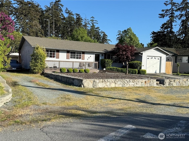 588 NE Harvest Dr, Oak Harbor, WA 98277 - ranch-style home with a garage and driveway