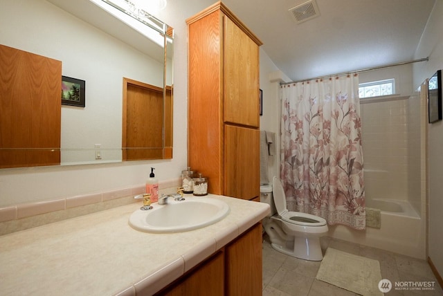201 S Cherry St, Dayton, WA 99328 - full bathroom featuring visible vents, vanity, toilet, shower / bathtub combination with curtain, and vaulted ceiling