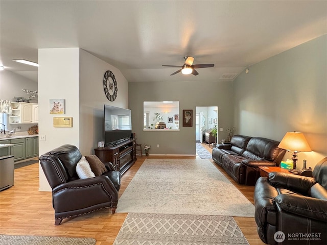 401 Dungeness Mdws, Sequim, WA 98382 - living room featuring a ceiling fan and light wood finished floors