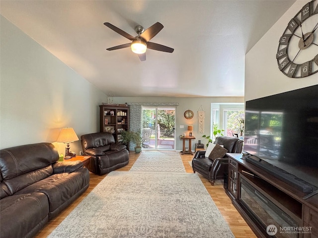 401 Dungeness Mdws, Sequim, WA 98382 - living room featuring lofted ceiling, a ceiling fan, and light wood finished floors