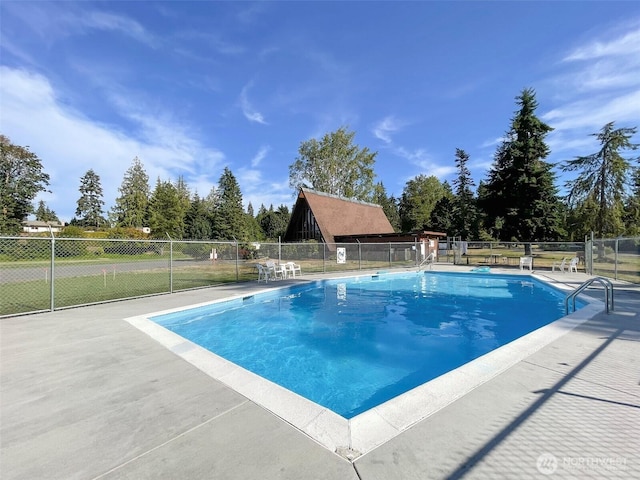 401 Dungeness Mdws, Sequim, WA 98382 - view of swimming pool featuring a patio area