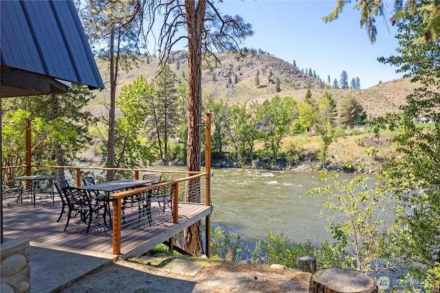 69 Ross Rd, Twisp, WA 98856 - dock featuring a mountain view and outdoor dining space