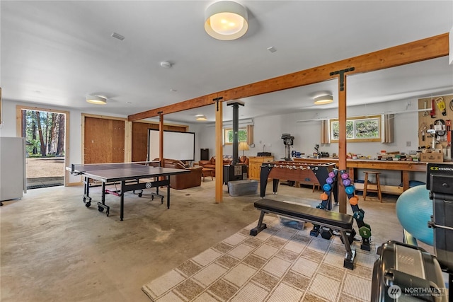 69 Ross Rd, Twisp, WA 98856 - game room with a workshop area, concrete flooring, and beam ceiling