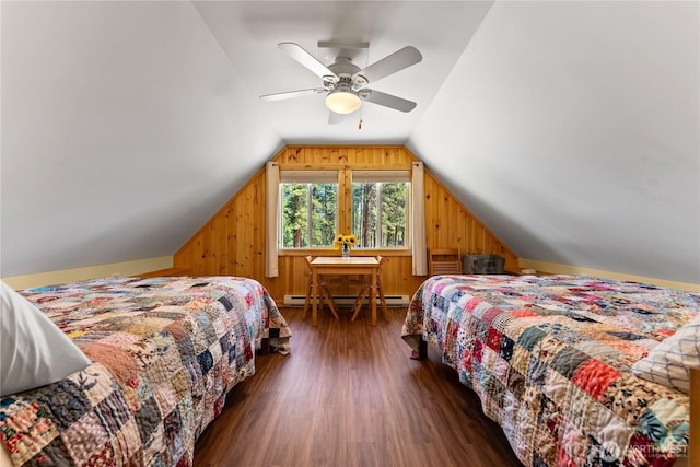 69 Ross Rd, Twisp, WA 98856 - bedroom featuring a baseboard radiator, wood finished floors, vaulted ceiling, wooden walls, and a ceiling fan