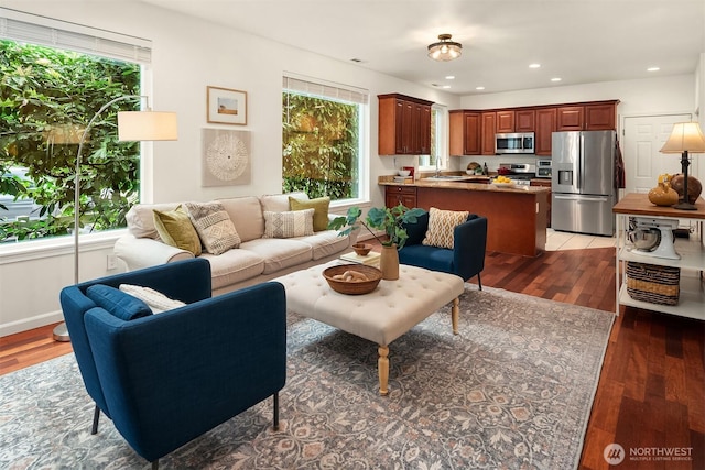 545 SE Lewis St, Issaquah, WA 98027 - living room with recessed lighting and wood finished floors