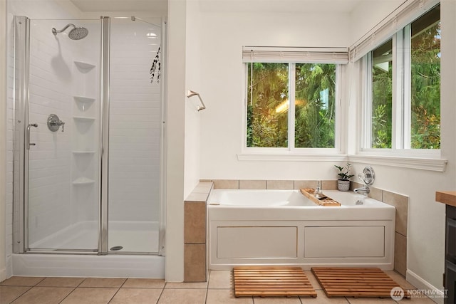 545 SE Lewis St, Issaquah, WA 98027 - full bath with a garden tub, a shower stall, and tile patterned floors
