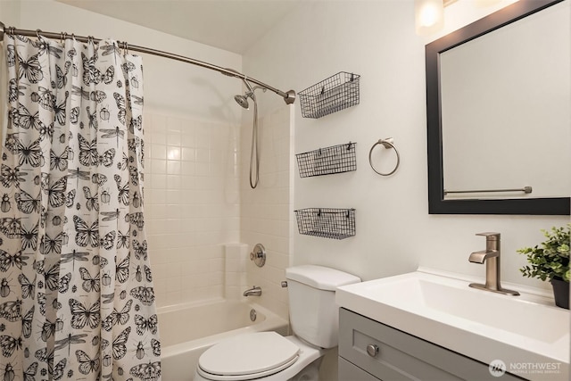 545 SE Lewis St, Issaquah, WA 98027 - bathroom featuring vanity, toilet, and shower / bath combo with shower curtain