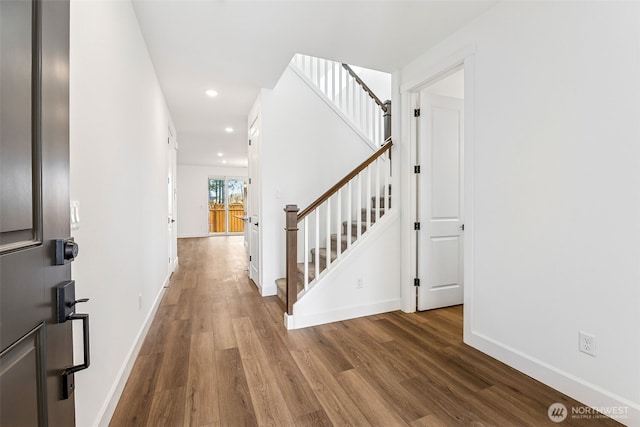 20336 150th St E Unit 588, Bonney Lake, WA 98391 - foyer with wood finished floors, recessed lighting, baseboards, and stairway