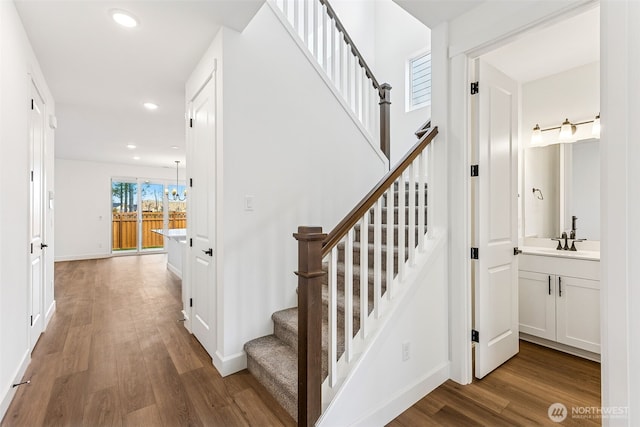 20336 150th St E Unit 588, Bonney Lake, WA 98391 - staircase featuring wood finished floors, recessed lighting, and baseboards
