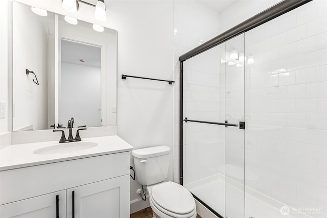 20336 150th St E Unit 588, Bonney Lake, WA 98391 - full bathroom featuring toilet, a shower stall, and vanity