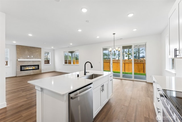 20336 150th St E Unit 588, Bonney Lake, WA 98391 - kitchen featuring stainless steel appliances, a sink, light countertops, and recessed lighting