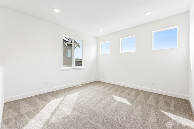 20336 150th St E Unit 588, Bonney Lake, WA 98391 - unfurnished room featuring carpet, baseboards, and recessed lighting