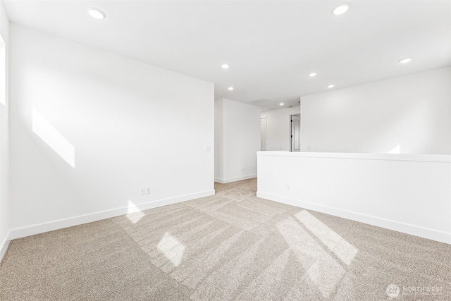 20336 150th St E Unit 588, Bonney Lake, WA 98391 - spare room with recessed lighting, light colored carpet, and baseboards